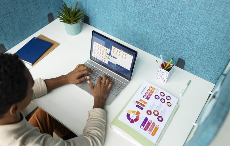 high-angle-woman-working-laptop